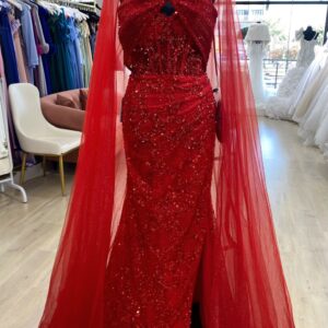 Red beaded evening dress with cape.