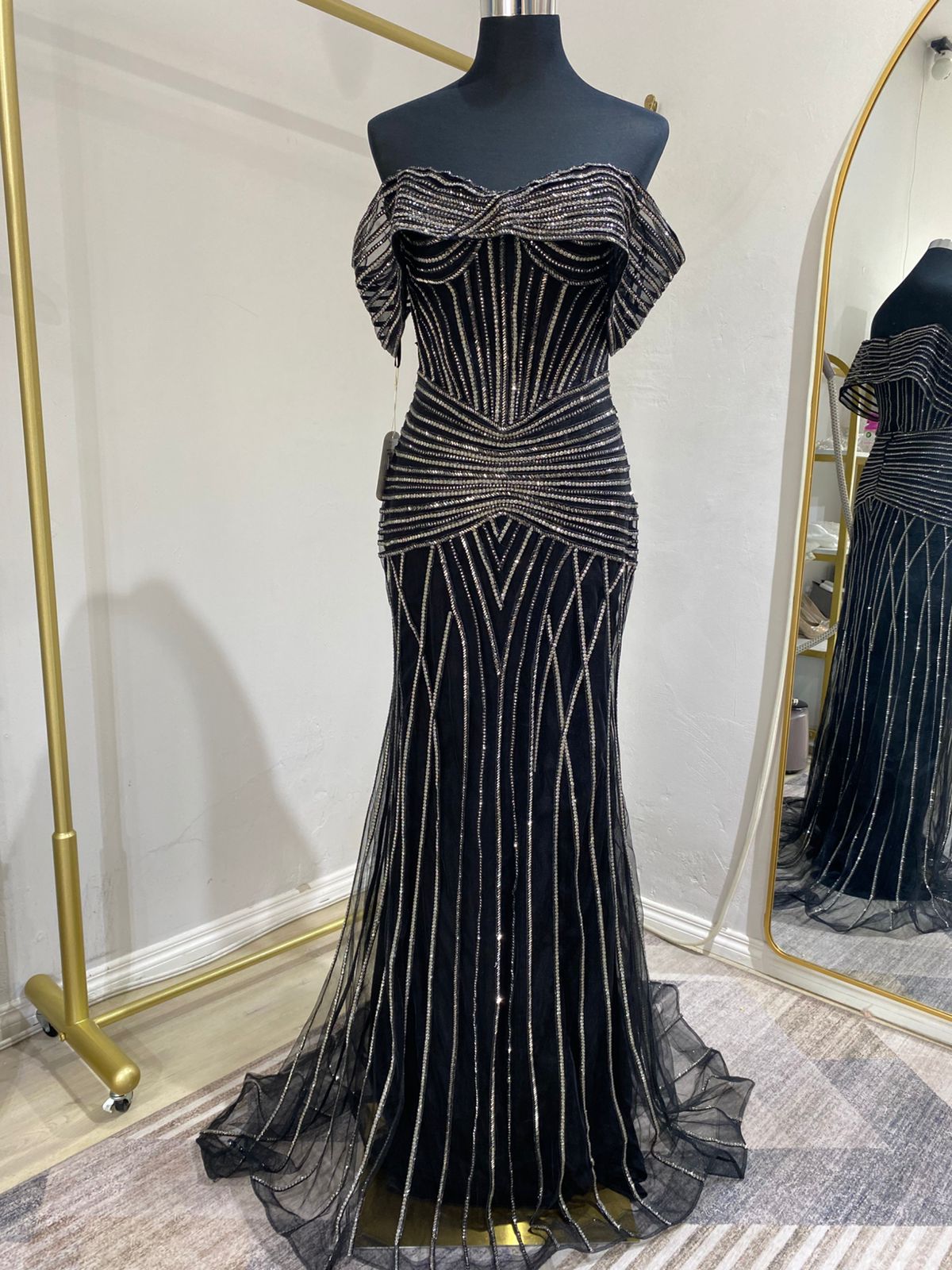 Black beaded mermaid evening dress with off-shoulder sleeves